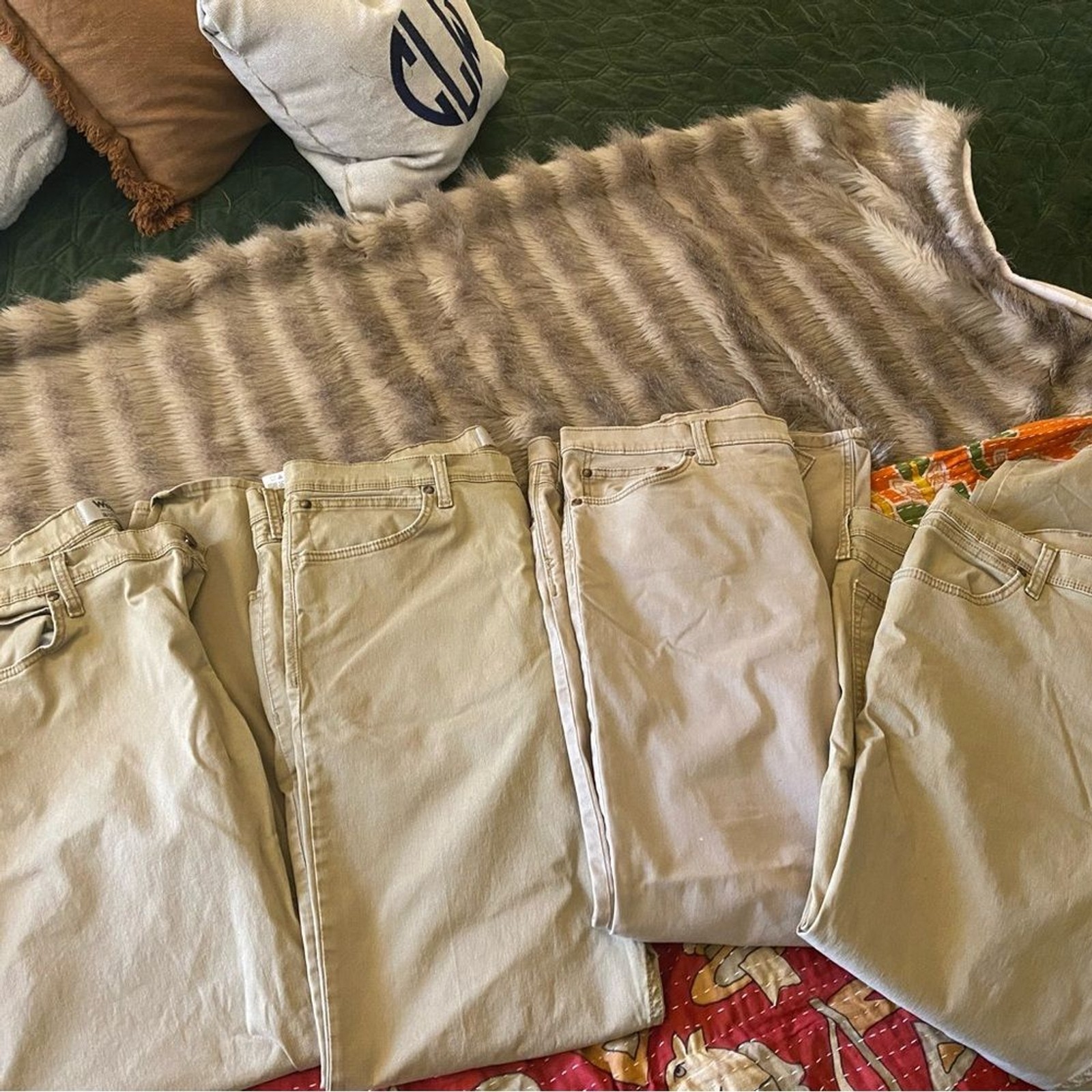 This is a bundle br Of 4 pair of Wrangler Men’s Khaki Jeans size 38×30