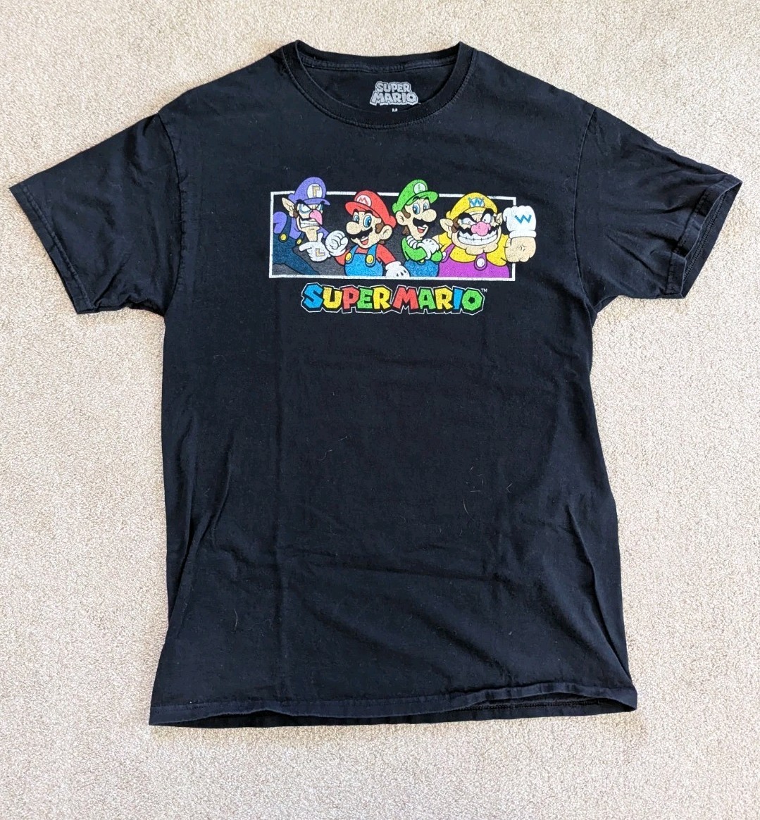 Many Assorted Graphic T-shirts, Various Sizes.