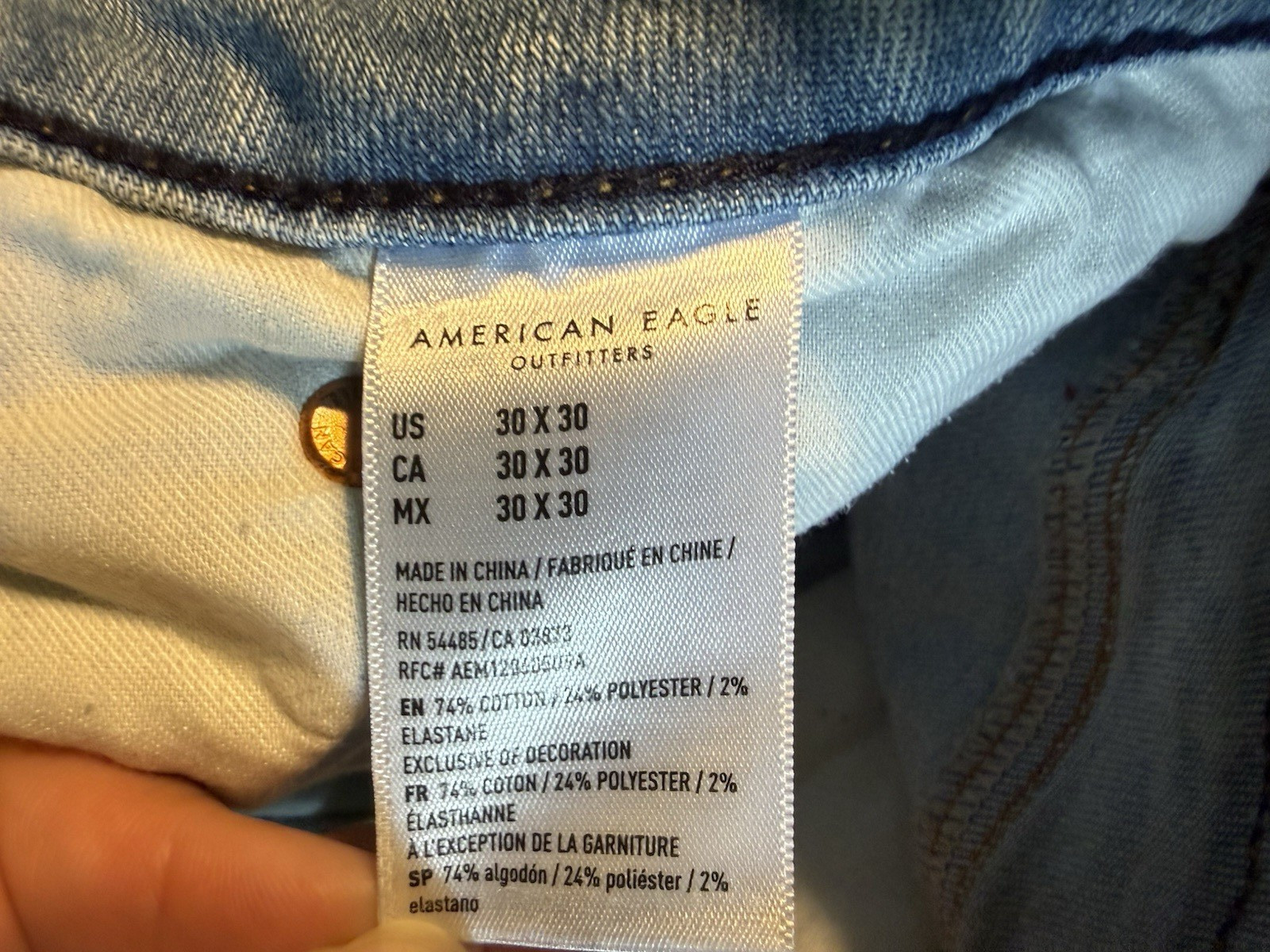 American Eagle Outfitters AirFlex Light Wash Distressed Skinny Jeans