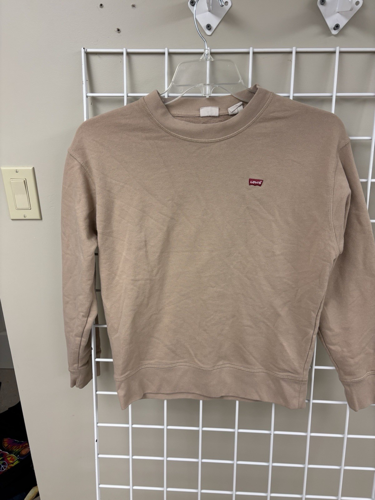 Tan Levi’s crewneck sweatshirt size small. 60/40 cotton/poly. No holes or stains