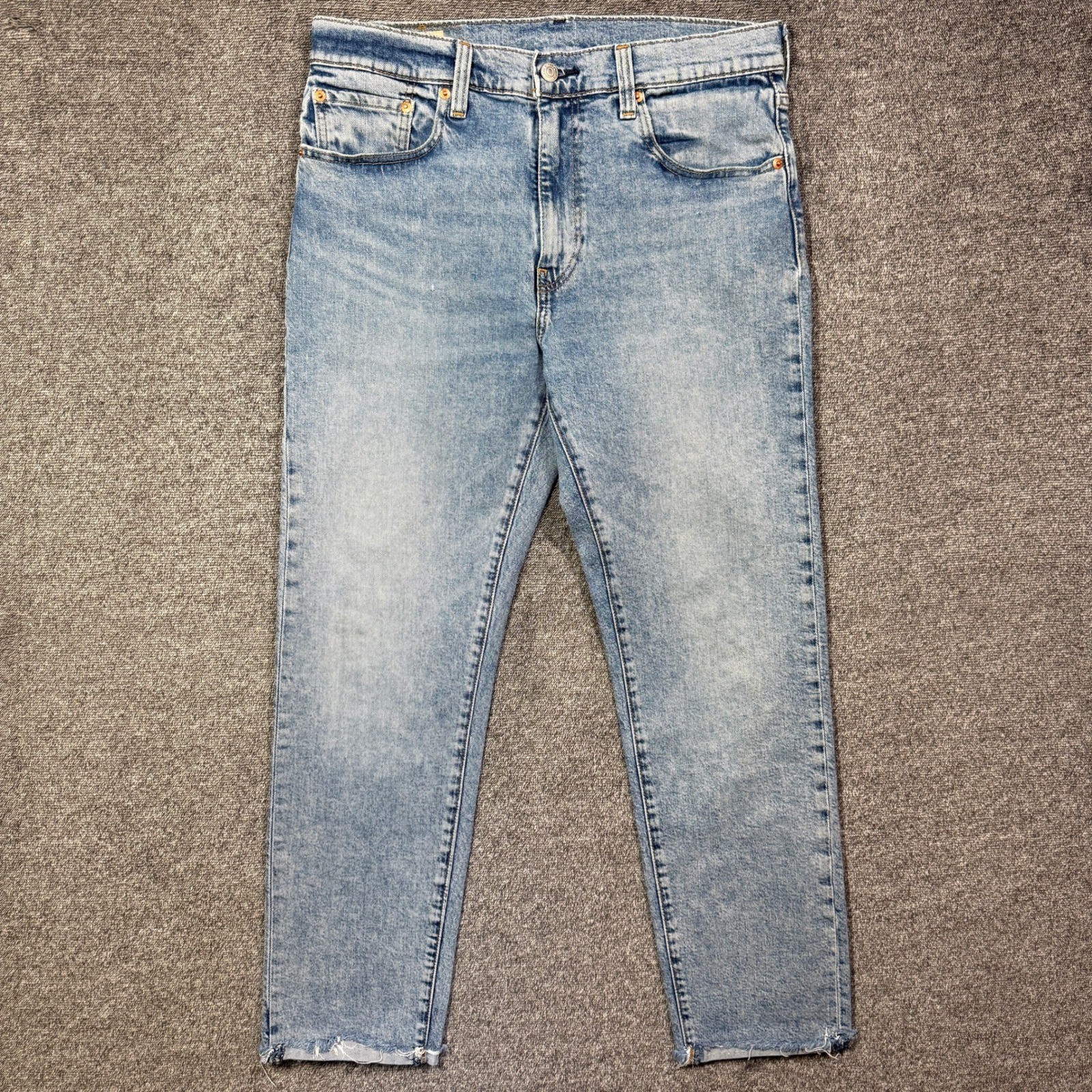 Levis Premium 502 Taper Fit Mens Jeans W33 L32 (Actual 29) Light Wash Raw Hem