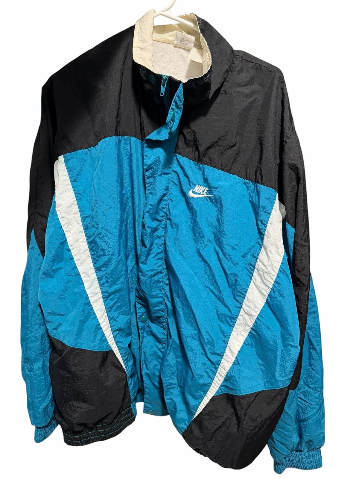 Vintage late 1980’s Nike Colorblock Windbreaker Jacket in Black and Teal