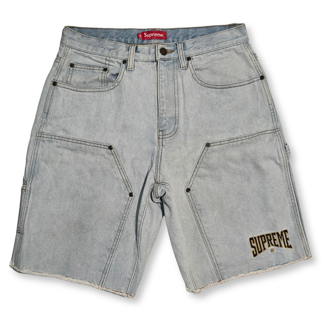 Supreme Cutoff Double Knee Denim Painter Shorts in a washed blue colorway.